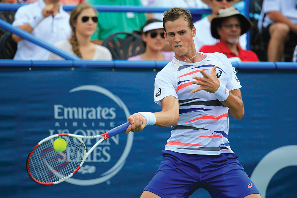 Vasek Pospisil of Canada returns a shot to Milos Raonic during the men’s final of the Citi Open tournament at the William H.G. FitzGerald Tennis Center in Washington, D.C. Photo courtesy of Rob Carr/Getty Images