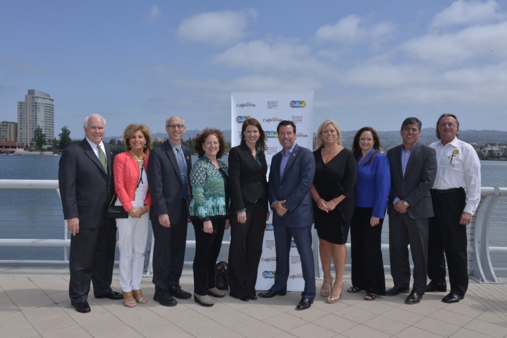 At the joint Visit Oakland & Visit California press conference, from left to right: Pat Gallagher of Super Bowl 50; Karolyn Kirchgesler of Team San Jose; Dan Kalb of the City of Oakland; Barbara Steinfeld of Visit TriValley; Caroline Beteta of Visit California; Keith Bruce of Super Bowl 50; Alison Best of Visit Oakland; Tammy Blount of the Monterey County Convention & Visitors Bureau; Jon Ballesteros of the San Francisco Travel Association; and Ken Fischang of Sonoma County Tourism.