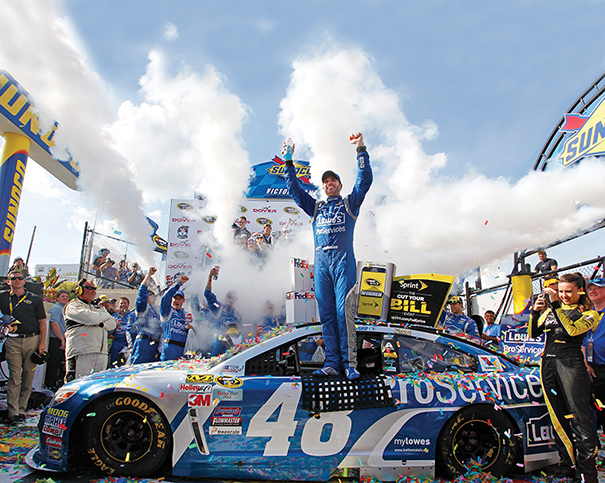 NASCAR driver Jimmie Johnson won the FedEx 400 benefiting Autism Speaks, which was staged in May at Dover International Speedway in Dover, Delaware. Photo courtesy of ASP/Cal Sport Media/Zumapress.com. 