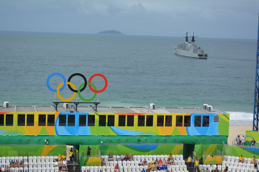 The Brazilian Navy has parked a vessel outside the beach volleyball venue.