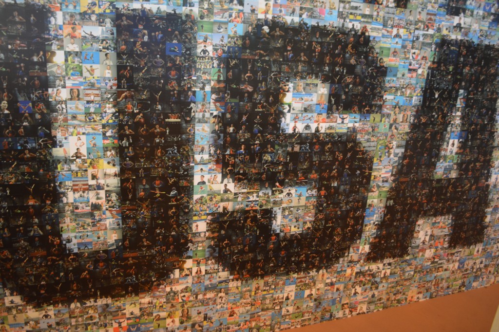 A mural of small photos of all 555 members of Team USA.