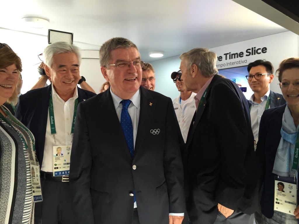 IOC President Thomas Bach tours the Pyeongchang 2018 exhibit on Copacabana beach.
