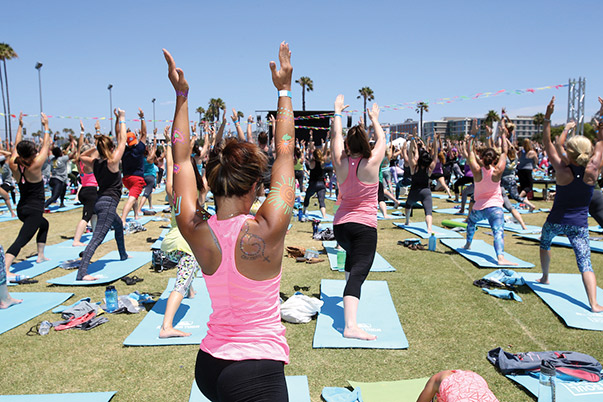 Major League Baseball incorporated a yoga event as part of its 2016 All-Star Game week of festivities in San Diego. The event attracted an estimated 2,500 participants, many of whom were women and children. Photo courtesy of Major League Baseball