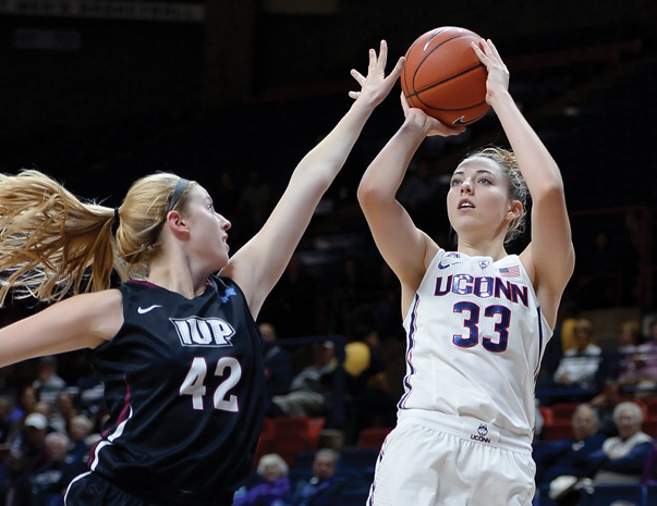 Katie Lou Samuelson (right) and the University of Connecticut have dominated NCAA’s women’s basketball. The team won the last four championships and extended its winning streak beyond 100 games this season. Photo courtesy of Jessica Hill/AP Images