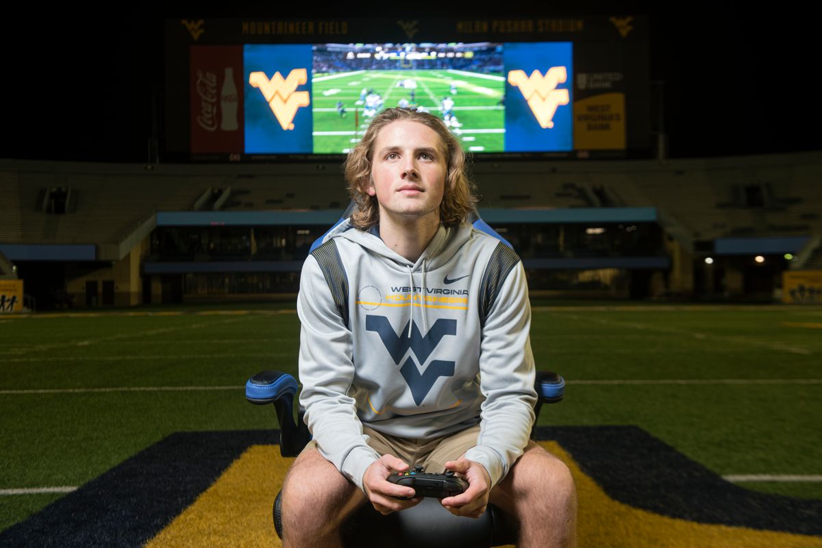 Noah Johnson, esports student-athlete, poses for photographs on Mountaineer Field, October 19th, 2021. (WVU Photo/Brian Persinger)