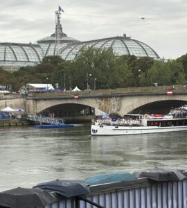 Greece, as by Olympic tradition, leads the boat parade during the 2024 Olympic Summer Games Opening Ceremony on Friday night along the Seine. Photo by Matt Traub/SportsTravel